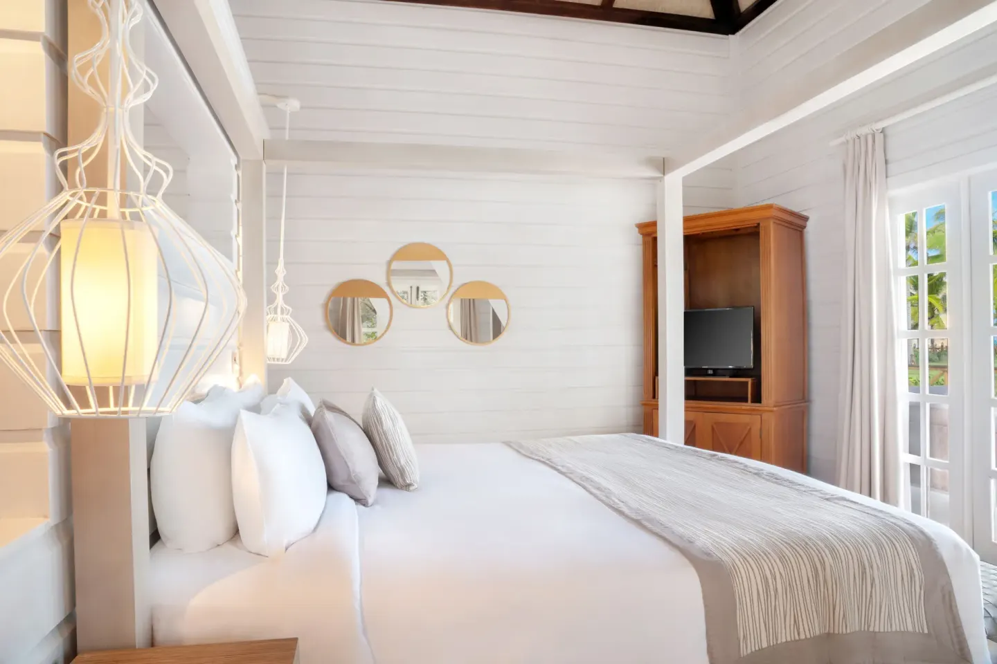 Villa Balcony bedroom with king bed and French doors at Sanctuary Cap Cana, a Luxury Collection Resort.