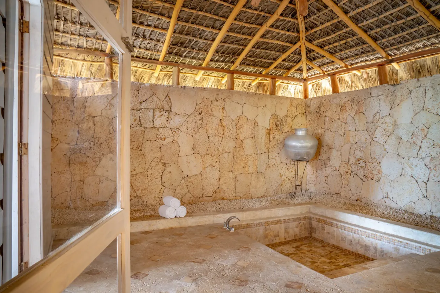 Oceanside villa stone bath area at Sanctuary Cap Cana, a Luxury Collection Resort.
