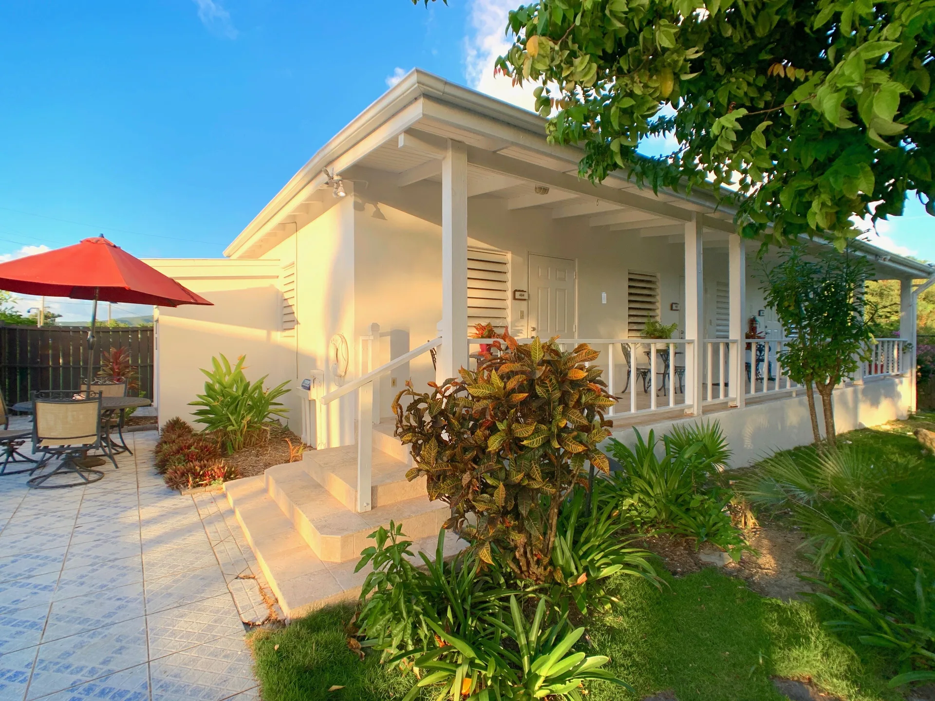 Courtyard Kitchen Studio exterior porch at Sand Castle on the Beach with private outdoor seating in Ocho Rios.