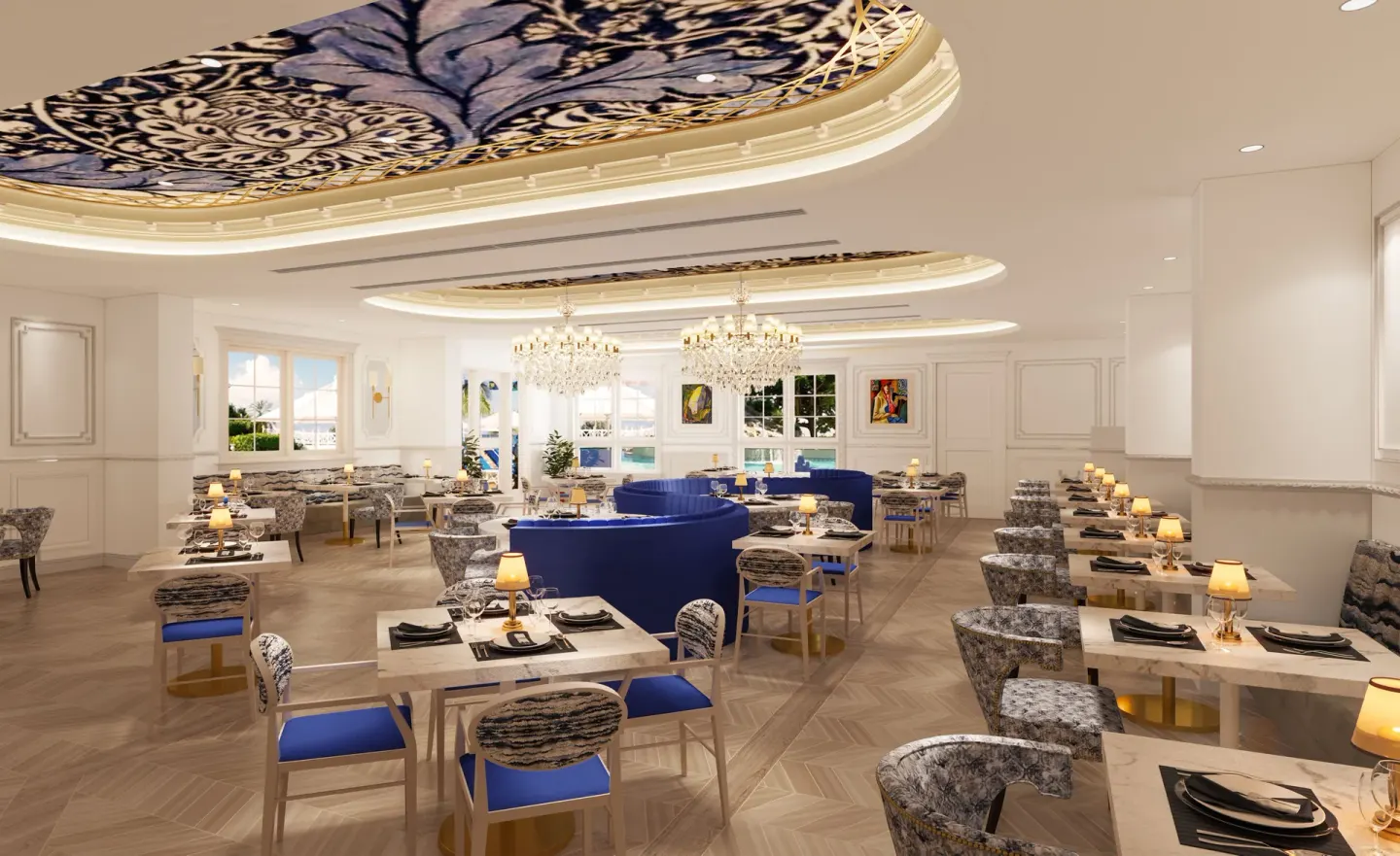Elegant dining room with blue seating and chandeliers at Sandals Dunns River.