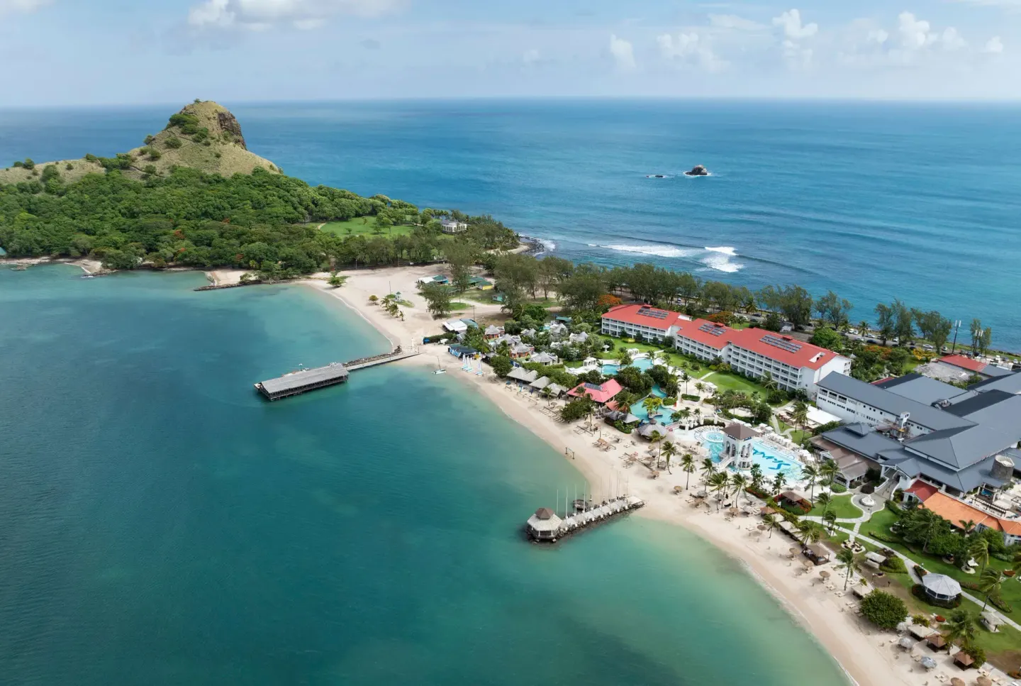 Aerial view of the resort beach and coastline at Sandals Grande St. Lucian.