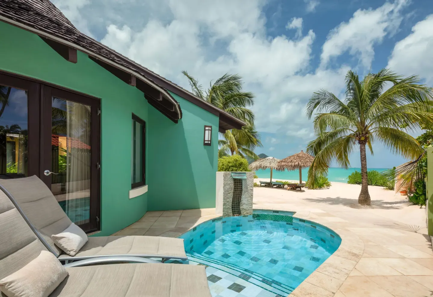 Private plunge pool beside a beachfront villa at Sandals Grande St. Lucian.