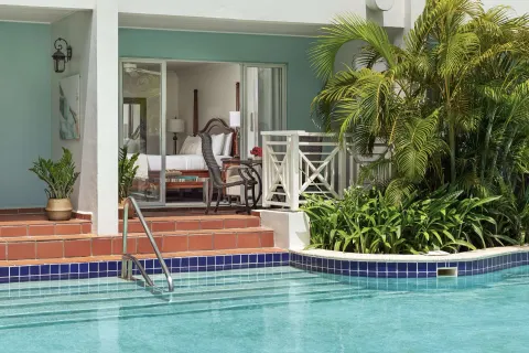 Swim-up Club Room patio and pool entrance at Sandals Grande St. Lucian.