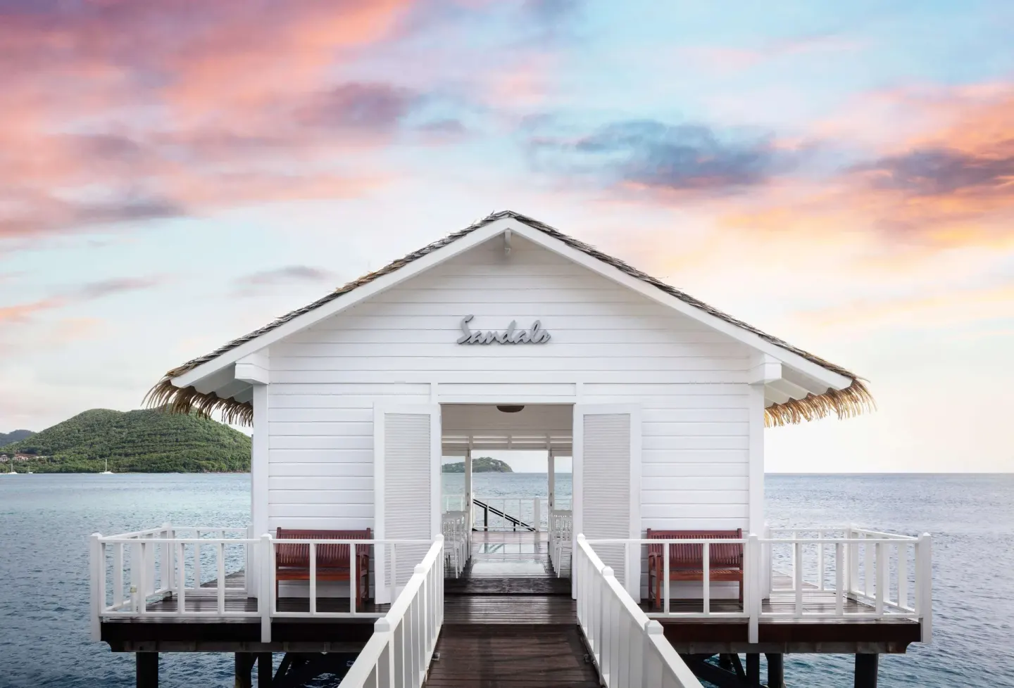 Overwater white chapel above the sea at Sandals Grande St. Lucian.