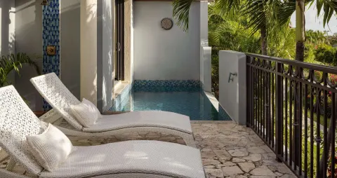 Private plunge pool and loungers for a Luxury Suite at Sandals Grenada.
