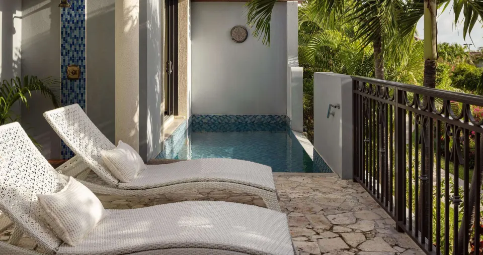 Private plunge pool and loungers for a Luxury Suite at Sandals Grenada.
