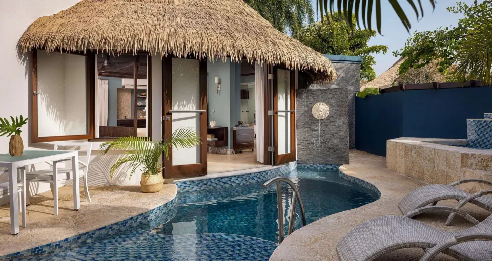 Daytime patio with private pool outside a rondoval suite at Sandals Grenada.