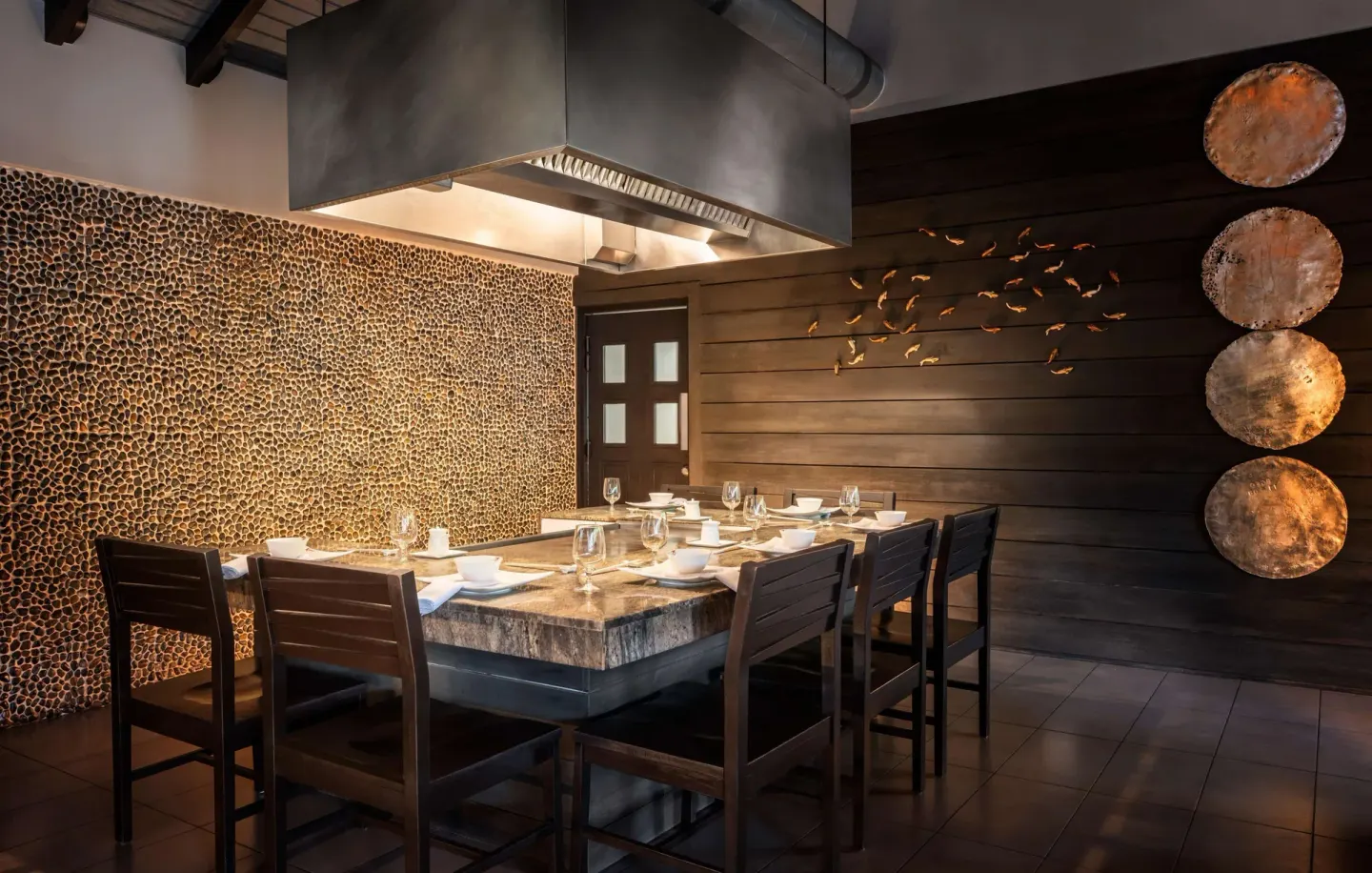 Teppanyaki table with overhead grill hood at Sandals Halcyon.
