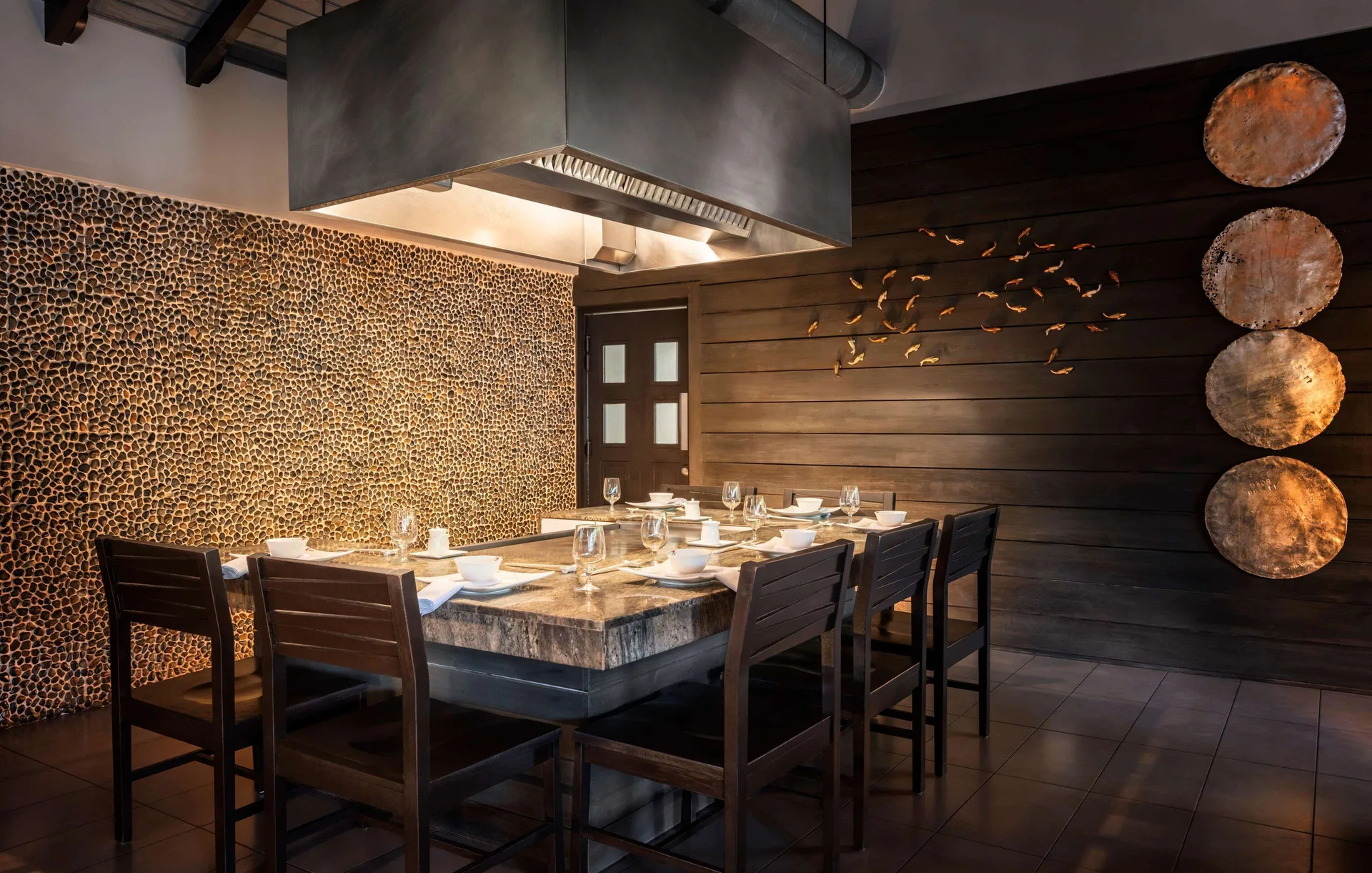 Teppanyaki table with overhead grill hood at Sandals Halcyon.