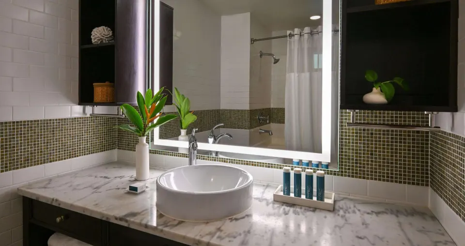 Luxury room bathroom vanity with vessel sink at Sandals Halcyon.