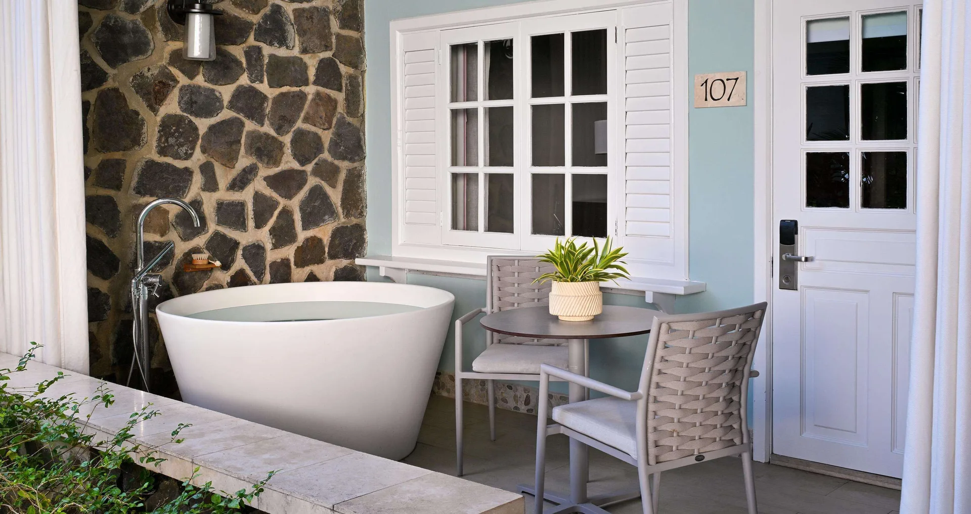 Beachfront Honeymoon Walkout Club Level Room with Patio Tranquility Soaking Tub at Sandals Halcyon with direct beach access and romantic Saint Lucia setting.