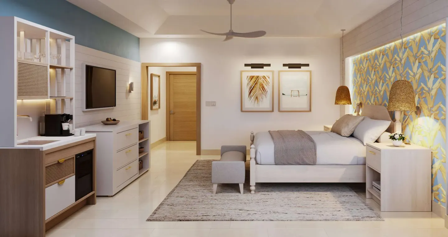 Contemporary king bedroom with kitchenette and blue accent wall at Sandals Montego Bay.