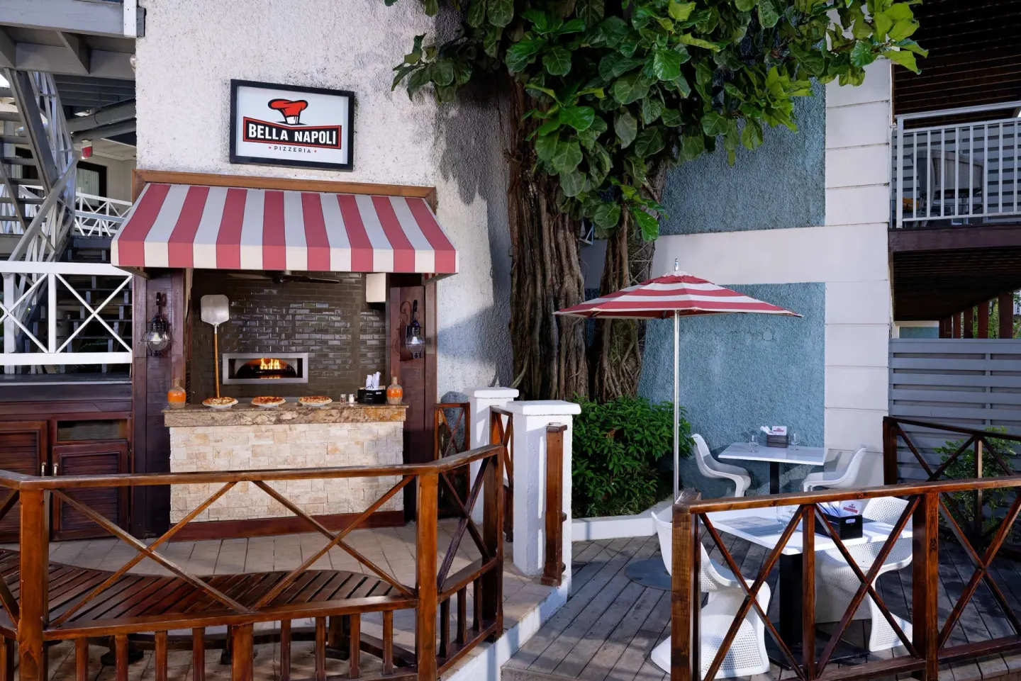 Bella Napoli Pizzeria oven and patio seating at Sandals Negril.