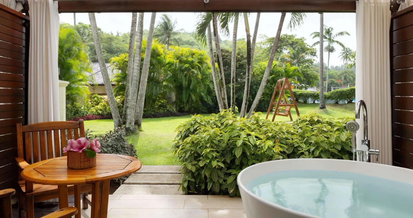 Garden patio with soaking tub at Sandals Regency La Toc honeymoon suite.