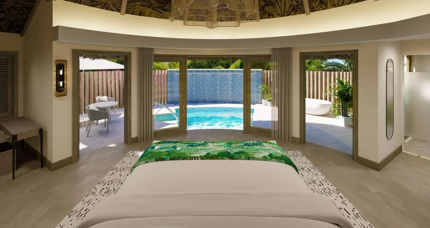 King bed facing a private pool in a Rondoval Butler Sky Villa at Sandals Regency La Toc.