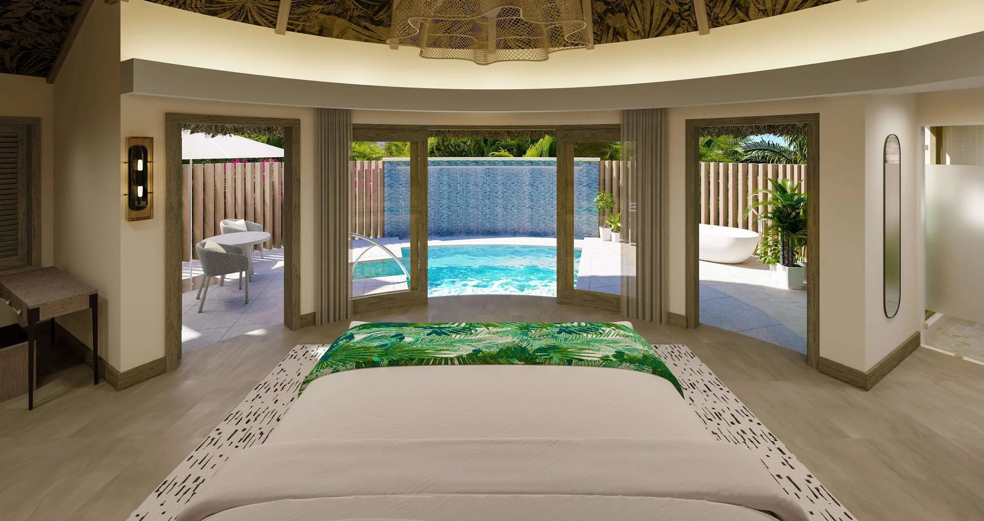 King bed facing a private pool in a Rondoval Butler Sky Villa at Sandals Regency La Toc.
