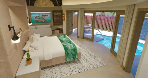 King bed in a Rondoval Butler Sky Villa beside the private pool at Sandals Regency La Toc.