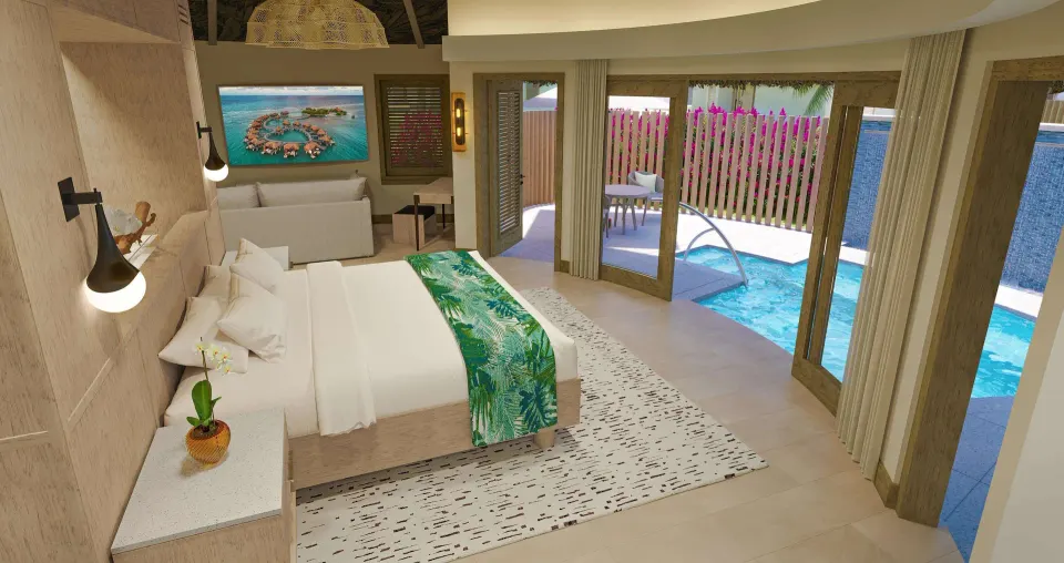 King bed in a Rondoval Butler Sky Villa beside the private pool at Sandals Regency La Toc.