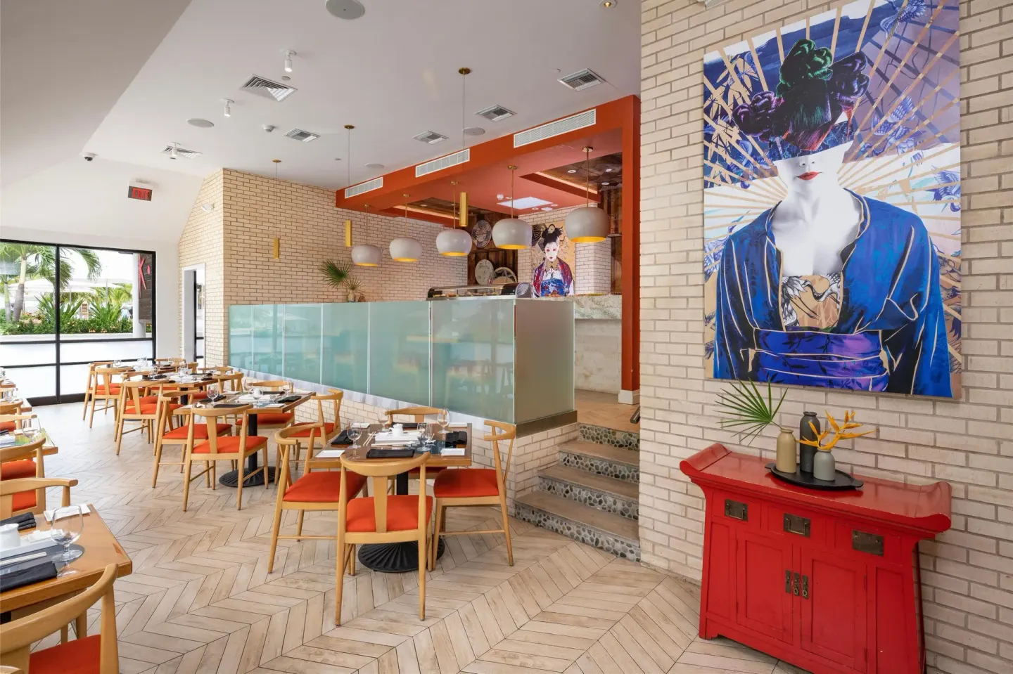 Japanese-style restaurant dining room with red accents at Sandals Royal Bahamian.