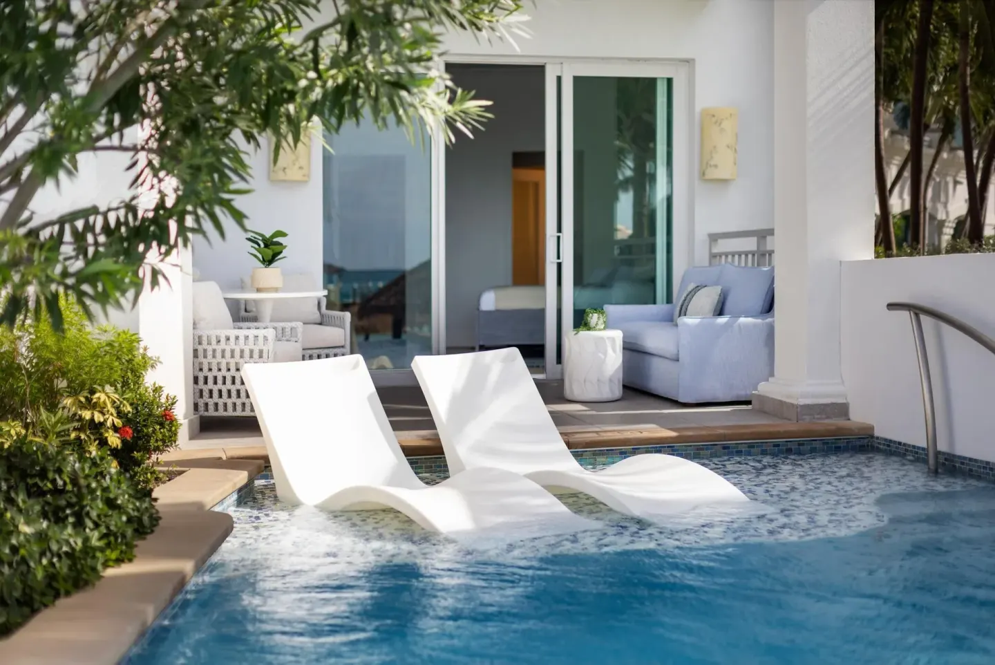 East Bay Beachfront Swim-up Butler Suite patio and pool at Sandals Royal Bahamian.