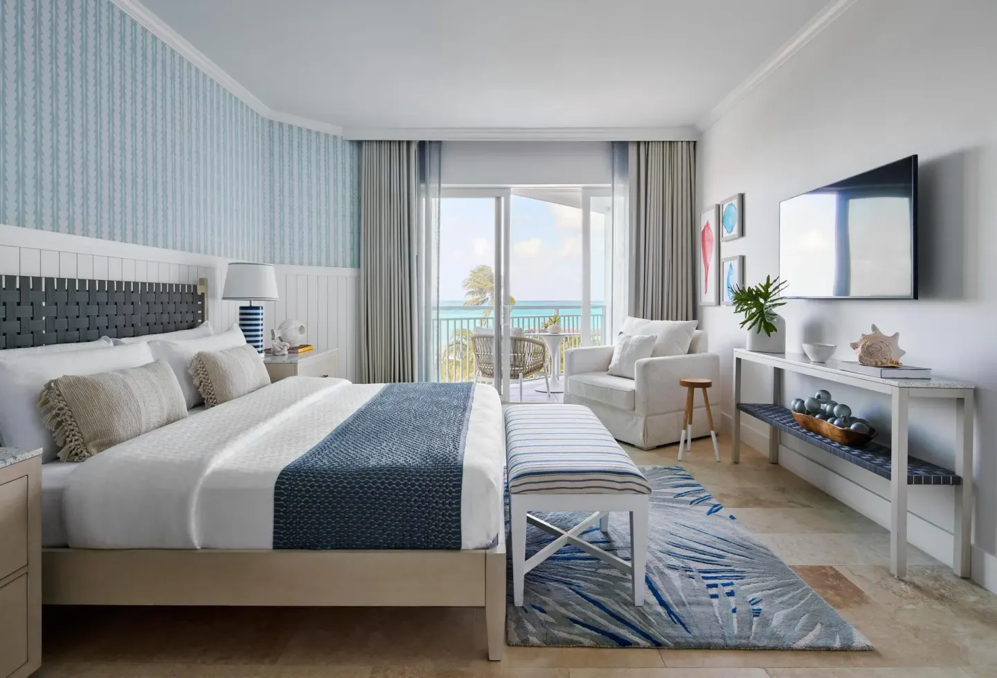 East Bay Honeymoon Oceanview Club Level Room with king bed at Sandals Royal Bahamian.