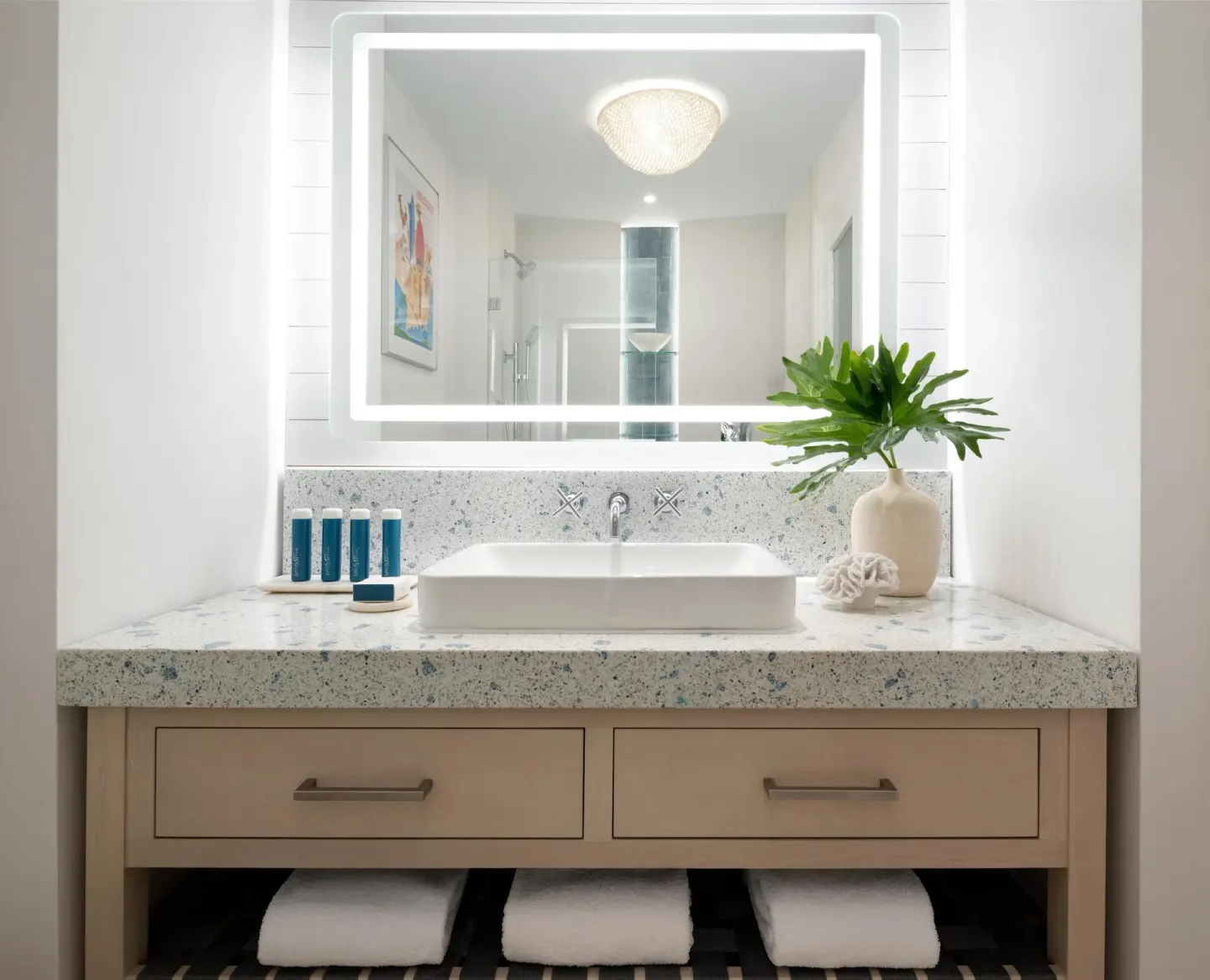 Bathroom vanity in an East Bay Oceanview Luxury room at Sandals Royal Bahamian.