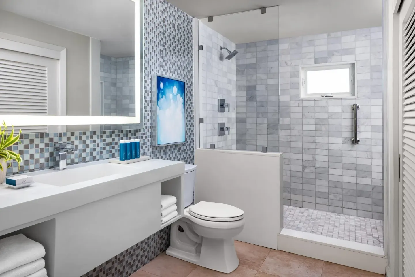Junior villa suite bathroom with glass shower at Sandals Royal Bahamian.
