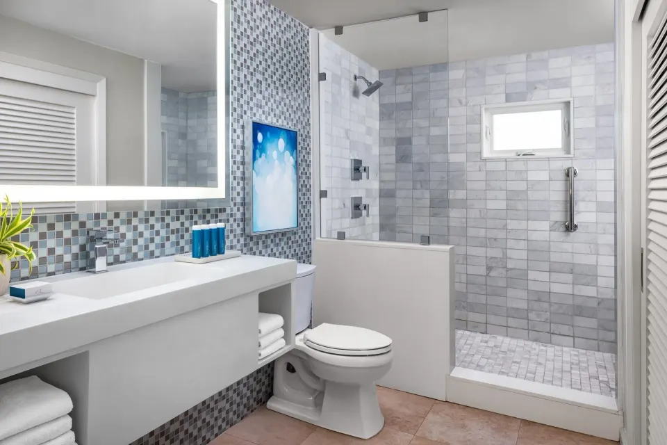 Junior villa suite bathroom with glass shower at Sandals Royal Bahamian.
