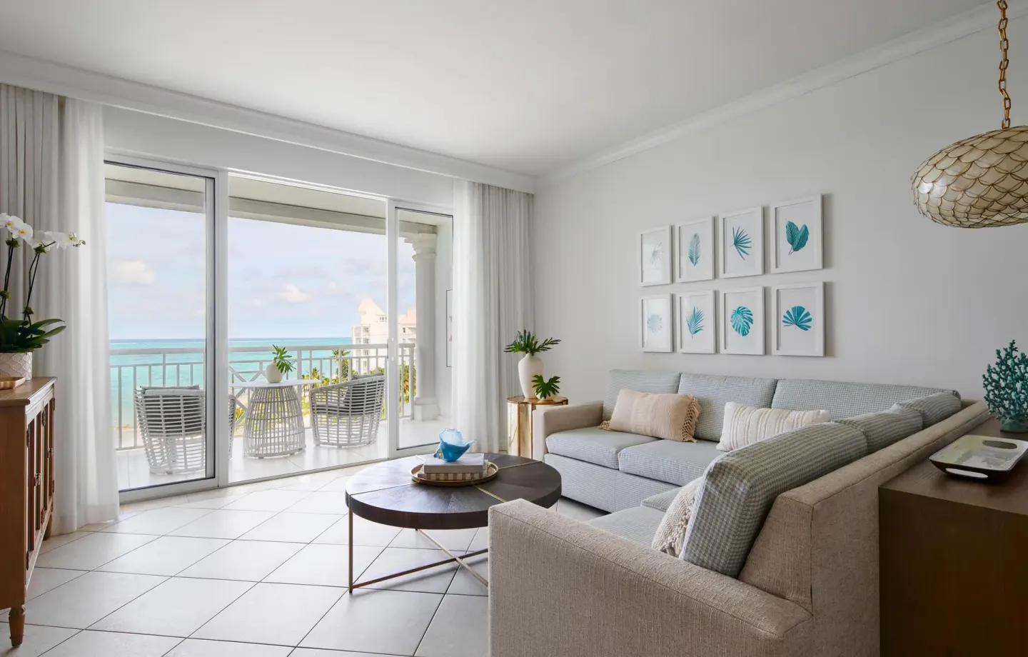 Oceanview living room in West Bay Honeymoon Oceanview Suite at Sandals Royal Bahamian.