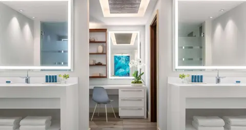 Double vanity bathroom and dressing area at Sandals Royal Barbados.