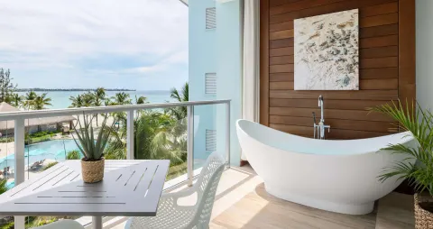 Royal Suite balcony with soaking tub and ocean view at Sandals Royal Barbados.