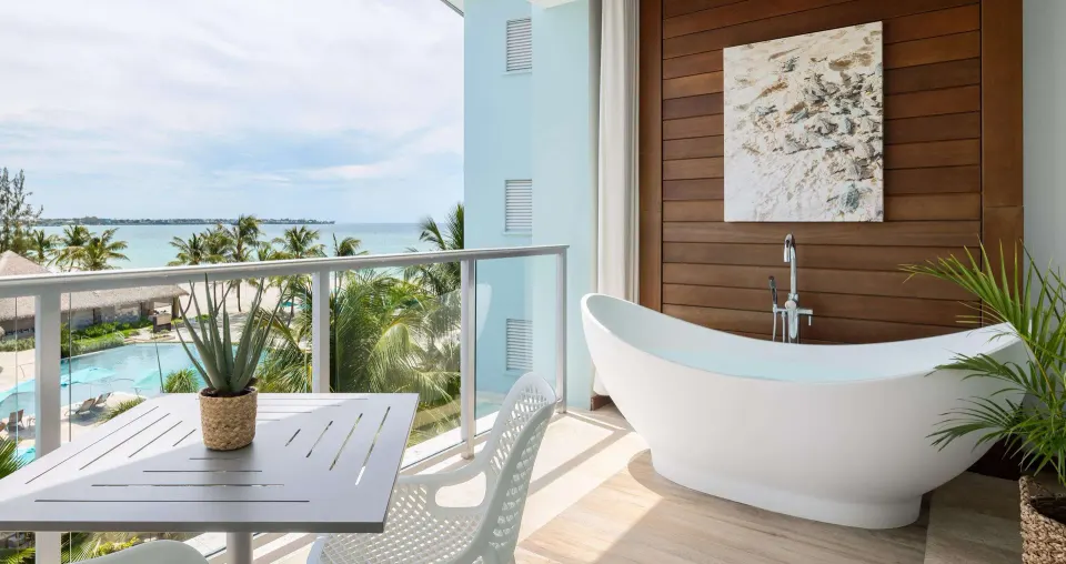 Royal Suite balcony with soaking tub and ocean view at Sandals Royal Barbados.