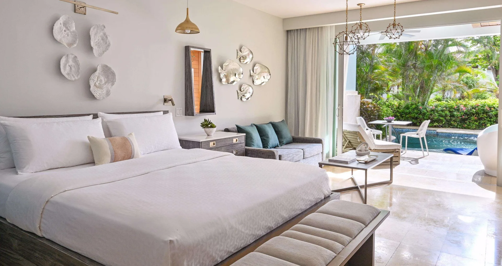 Royal Seaside Swim-up suite with king bed and pool patio at Sandals Royal Barbados.