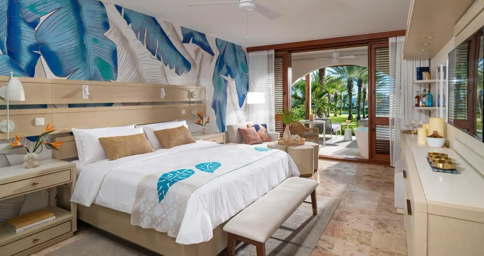 King bed suite with patio and soaking tub view at Sandals Royal Curacao.