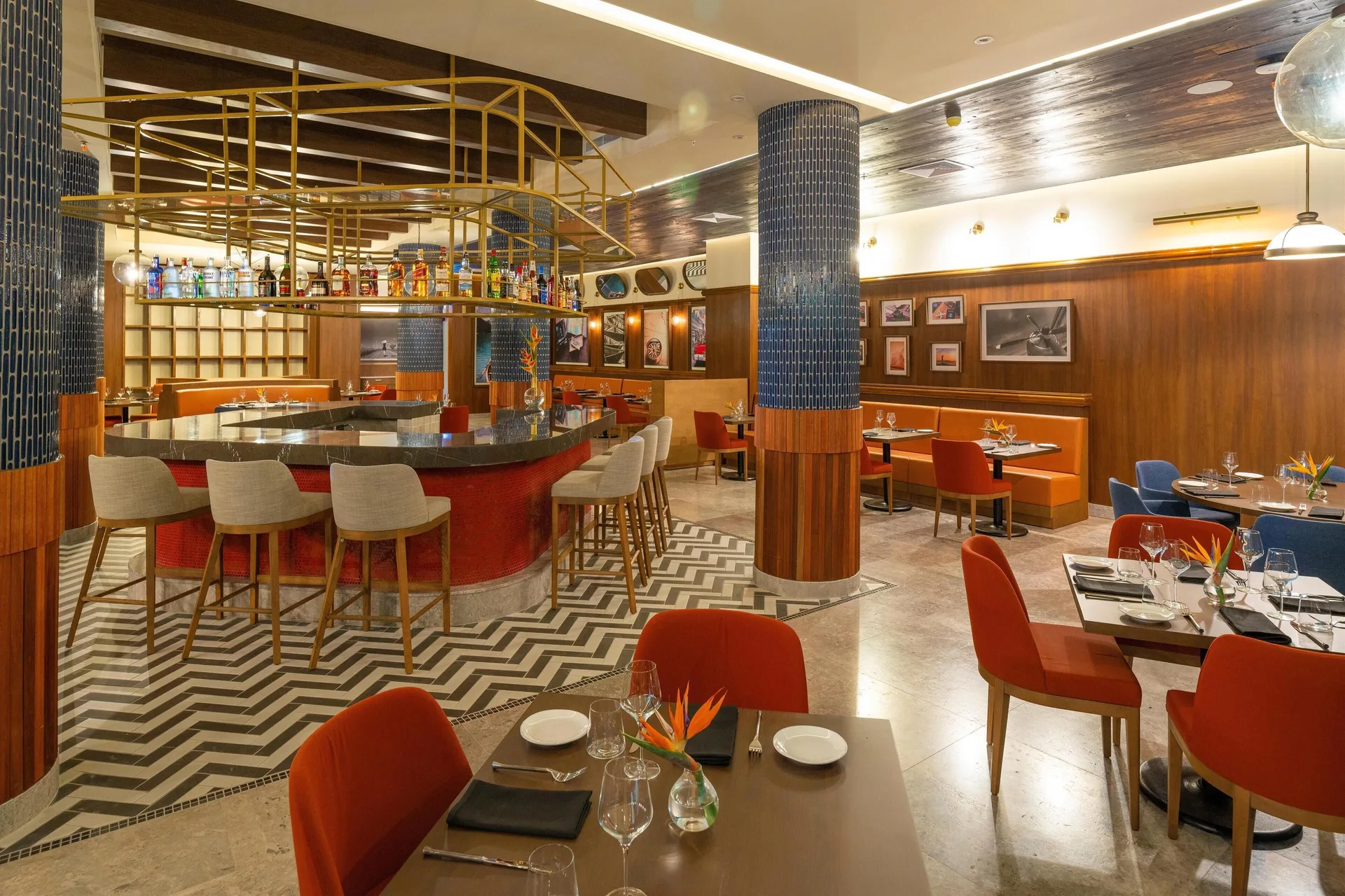Restaurant dining room and central bar at Sandals Royal Curacao.