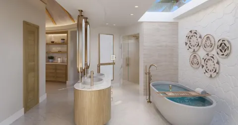 Asombroso Rondoval Butler Villa bathroom with soaking tub at Sandals Royal Curacao.