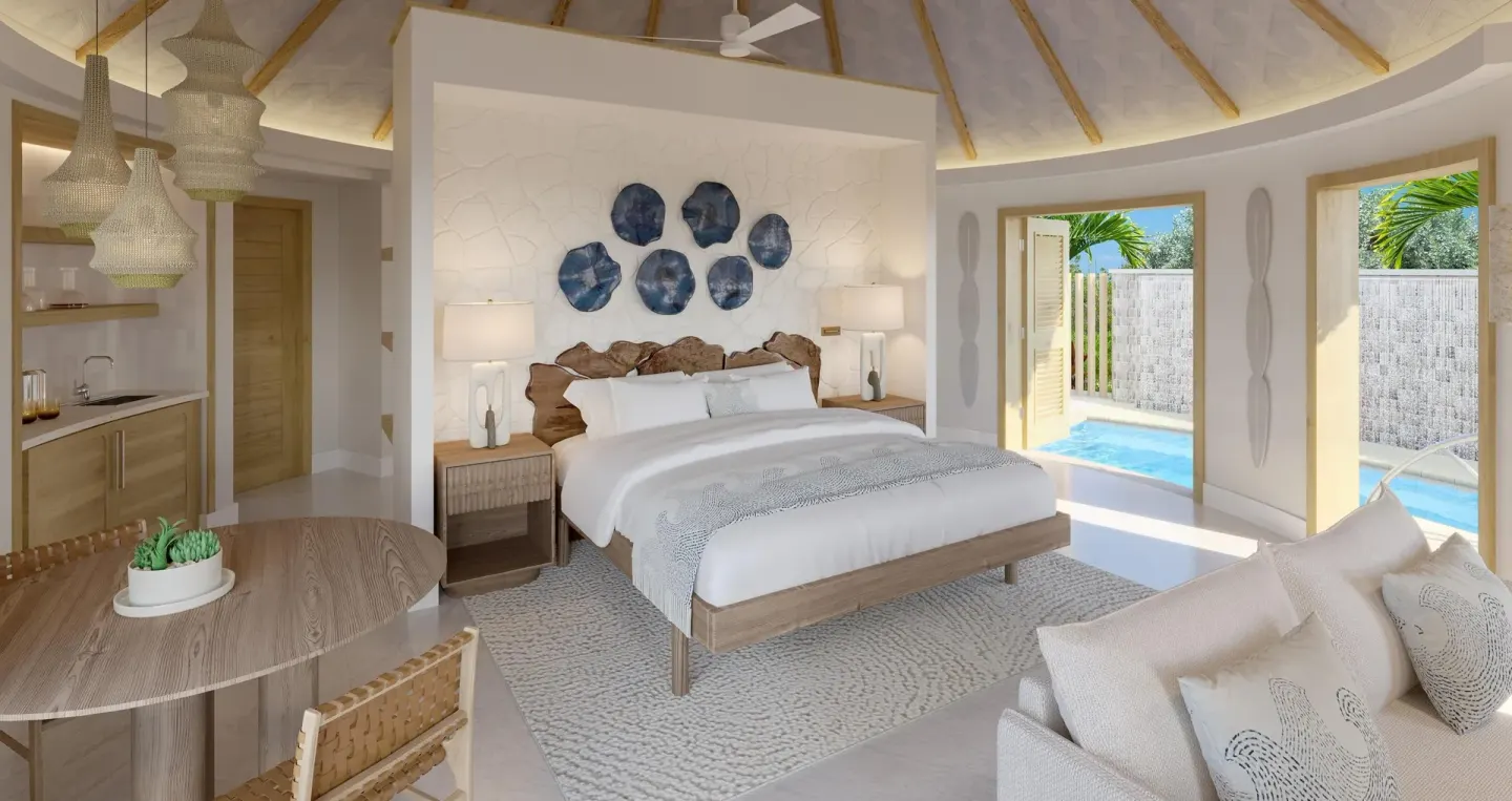 Asombroso Rondoval Butler Villa king bed and private pool view at Sandals Royal Curacao.