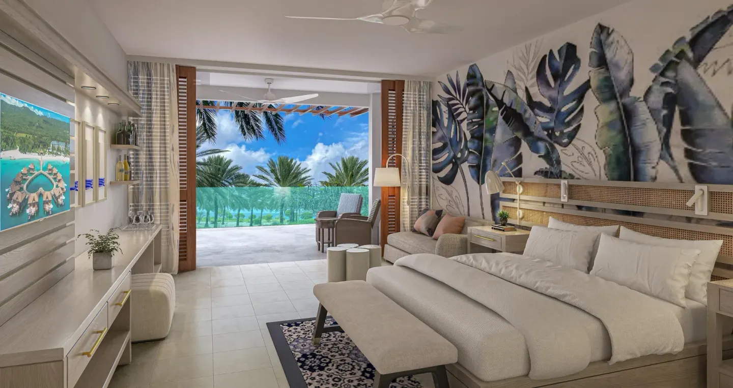Carisia Club Level Oceanview Room with king bed and balcony at Sandals Royal Curacao.