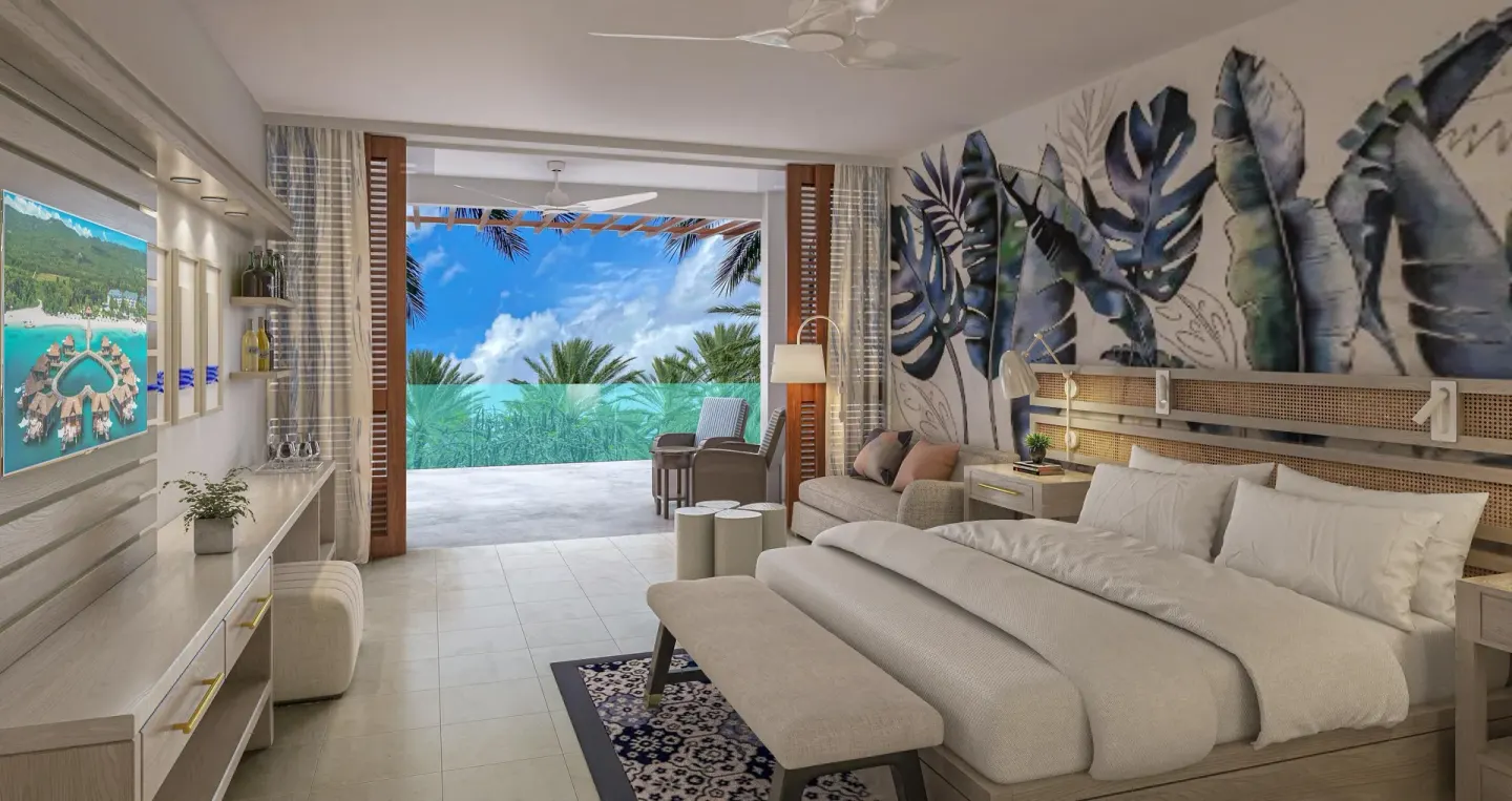 Subi Club Level Room with king bed and patio at Sandals Royal Curacao.