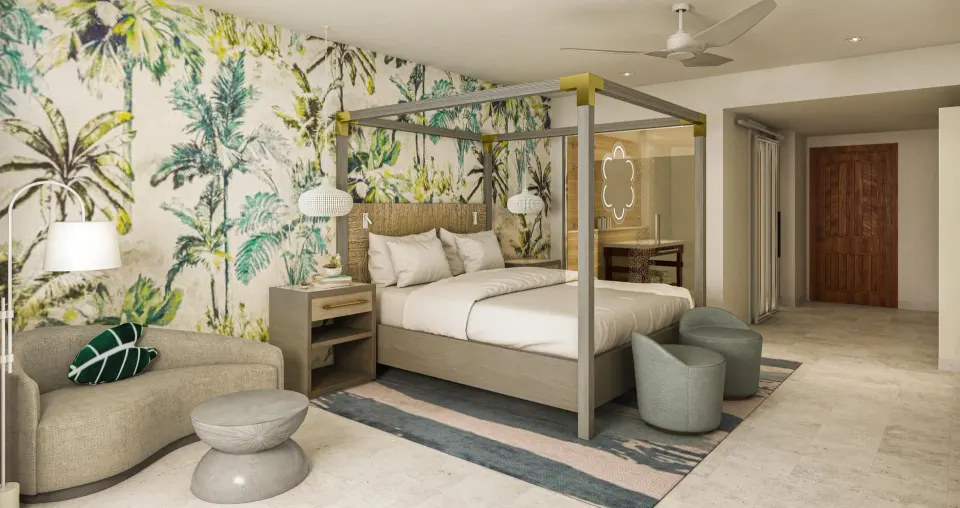 Subi Swim-up Junior Suite king bed and lounge seating at Sandals Royal Curacao.