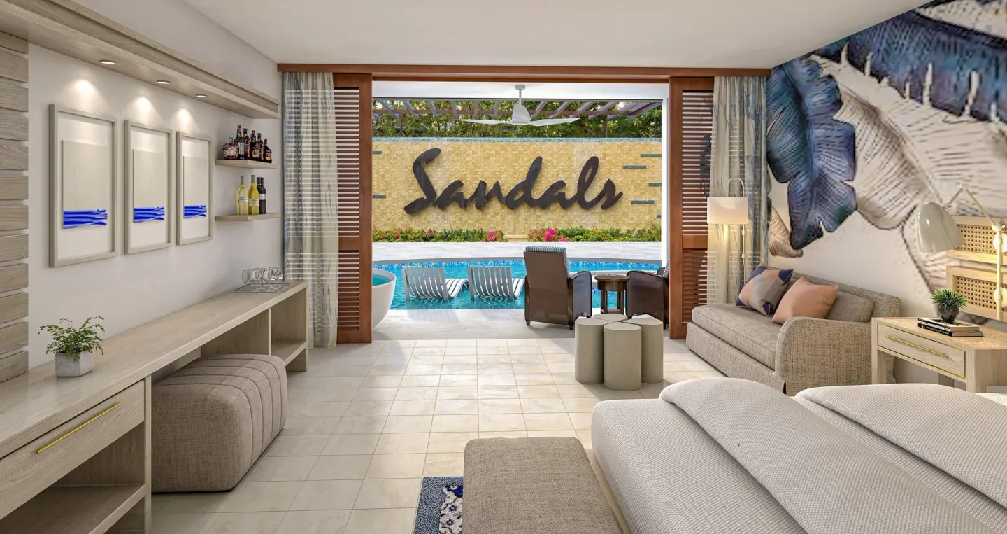 Swim-up junior suite patio and sitting area at Sandals Royal Curacao.