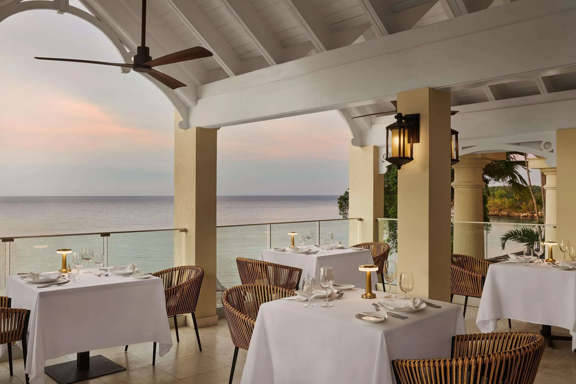 Open-air oceanview restaurant terrace at Sandals Royal Plantation.