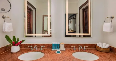 Double vanity bathroom in a Honeymoon Suite at Sandals Royal Plantation.