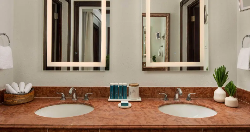Double vanity bathroom in an ocean view suite at Sandals Royal Plantation.