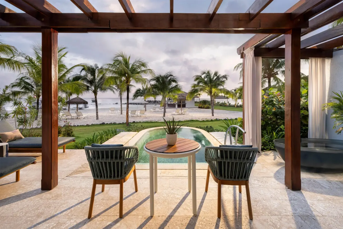 Beachfront villa patio with plunge pool at Sandals St. Vincent and the Grenadines.