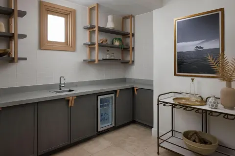 Guest suite kitchenette and bar cart at Sandals St. Vincent and the Grenadines.