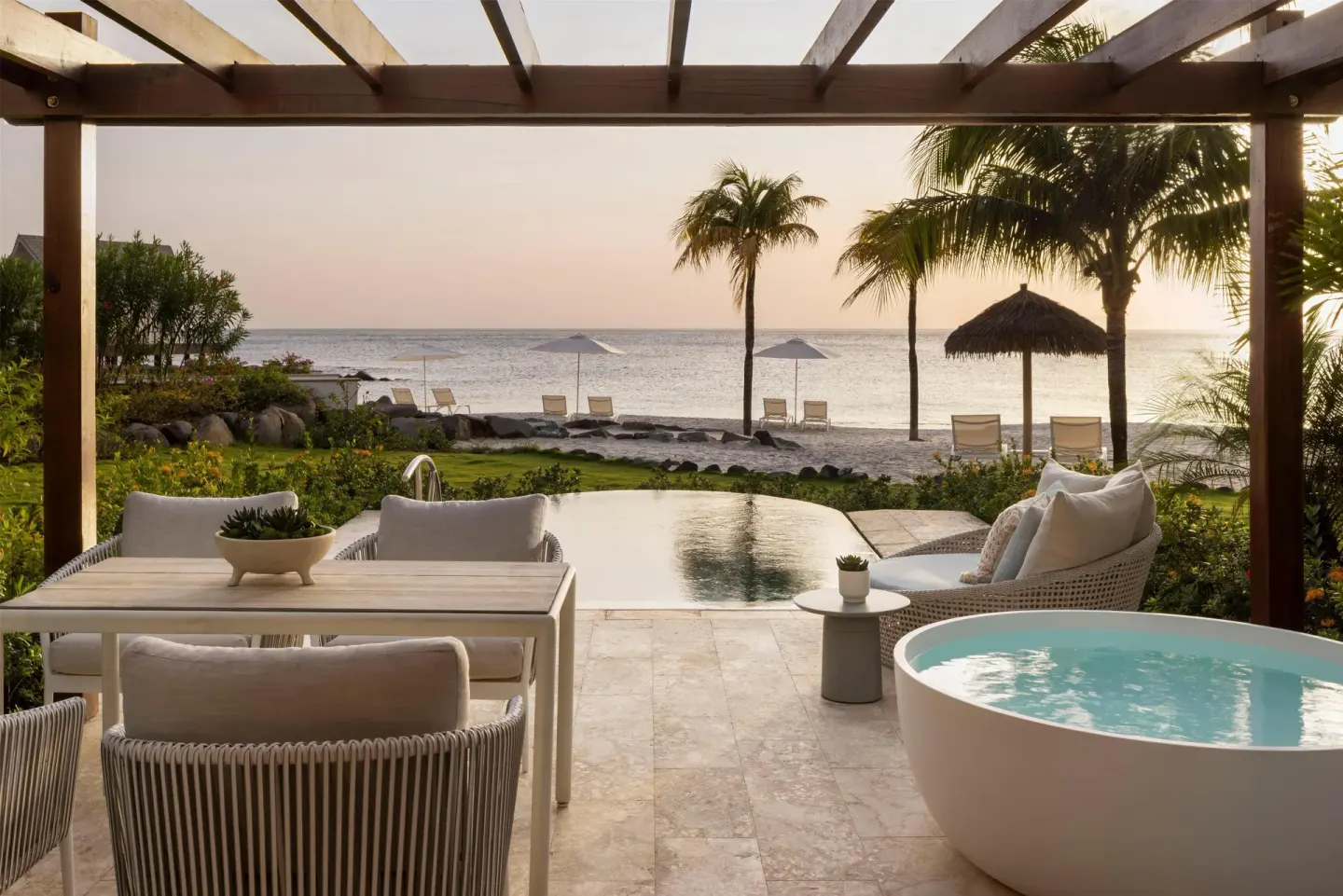 Oceanfront patio with plunge pool and soaking tub at Sandals St. Vincent and the Grenadines.