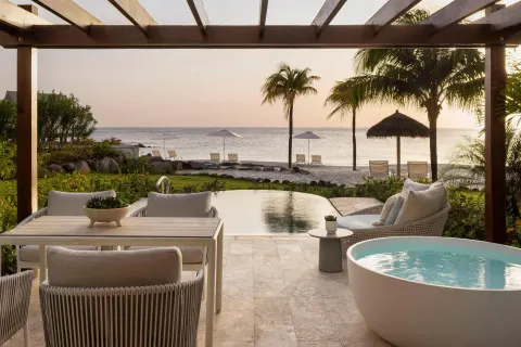 Oceanfront patio with plunge pool and soaking tub at Sandals St. Vincent and the Grenadines.
