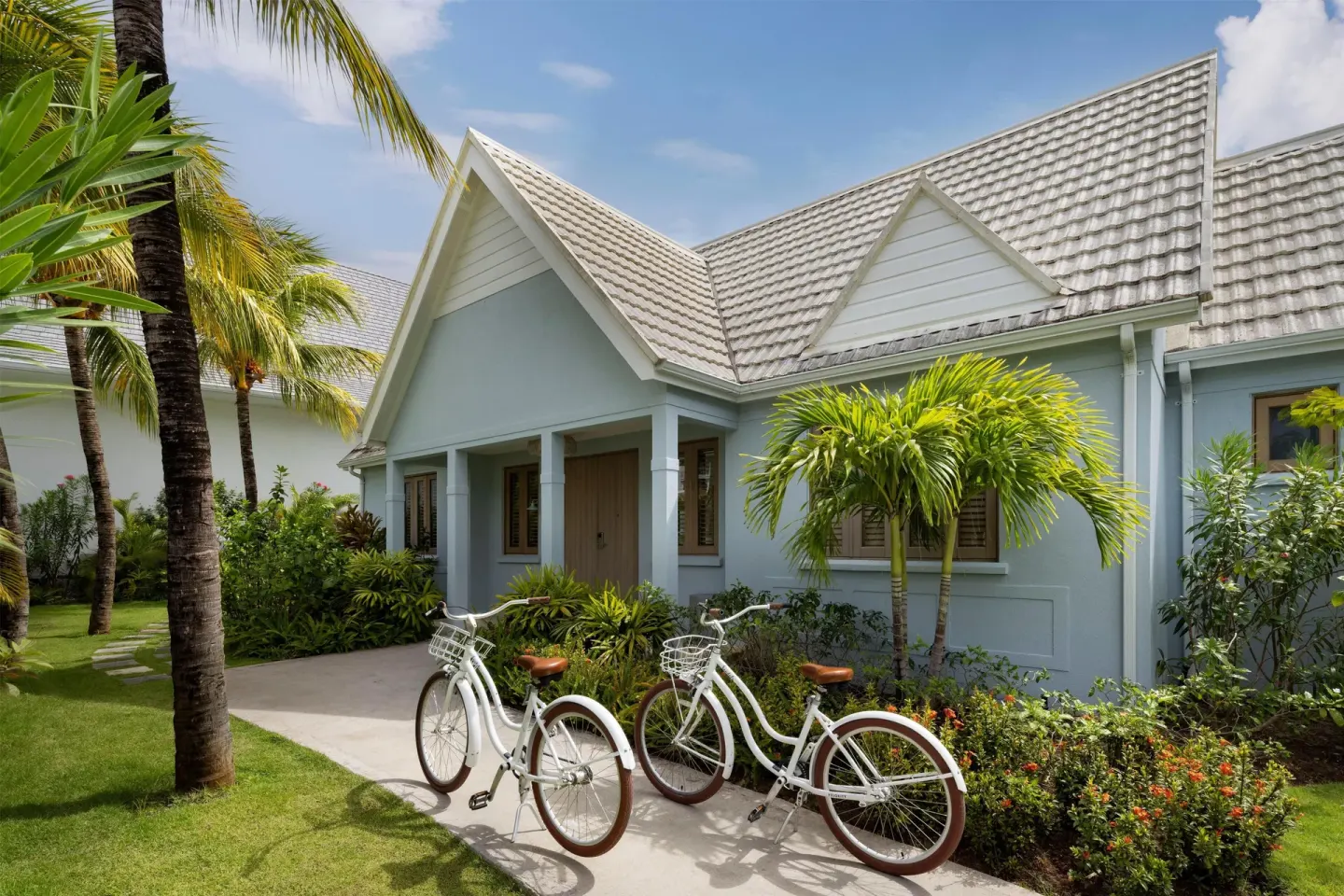 Tropical resort walkway with bicycles at Sandals St. Vincent and the Grenadines.