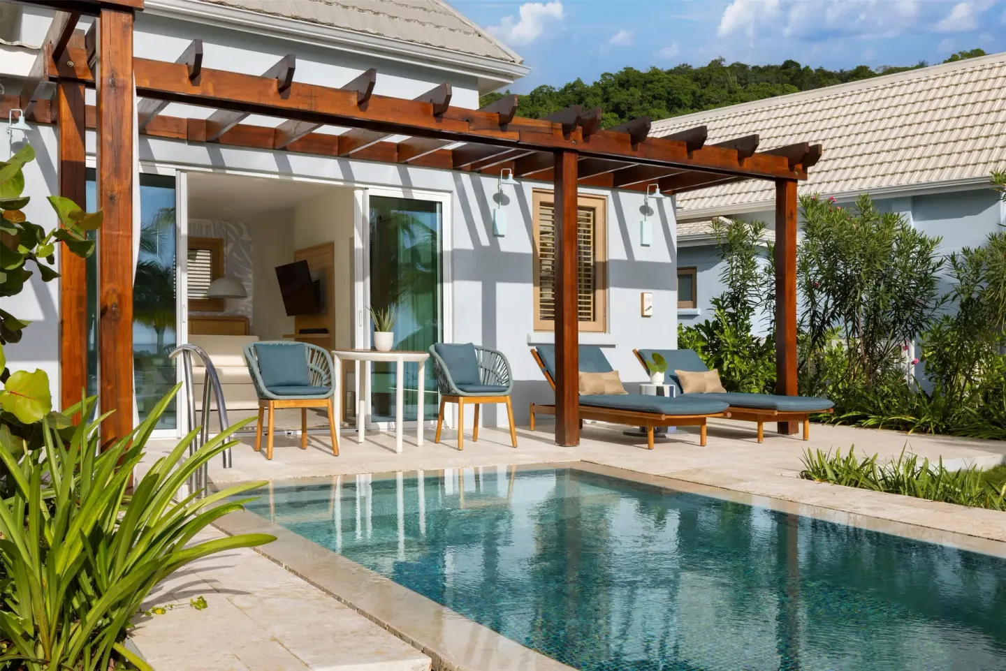 Villa patio with plunge pool and lounge chairs at Sandals St. Vincent and the Grenadines.
